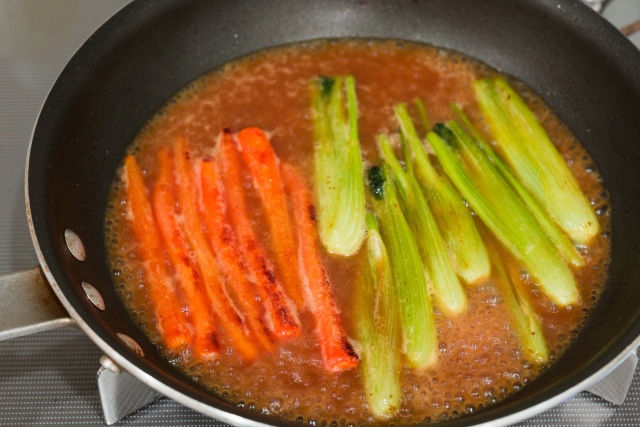 Add the orange juice, and salt and return the vegetables to the pan. Cook until the vegetables are tender and the sauce has reduced to thick syrup. Finish by adding the Grand Marnier. Add the orange juice, and salt and return the vegetables to the pan. Cook until the vegetables are tender and the sauce has reduced to thick syrup. Finish by adding the Grand Marnier.